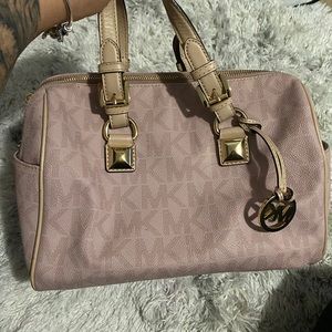 Baby pink handbag Michael Kors gently used